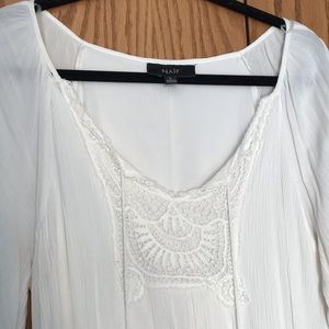 White open-shoulder flowy dress